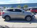 2014 Hyundai Santa Fe — photo 14 of 17 | VIN 5XYZTDLB1EG146699