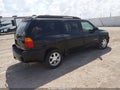 2003 GMC Envoy — photo 4 of 15 | VIN 1GKES16S336236372