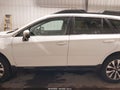 2016 Subaru Outback — photo 14 of 16 | VIN 4S4BSENC5G3236232