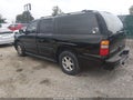 2003 GMC Yukon XL — photo 3 of 12 | VIN 1GKFK66U63J302929