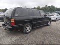 2003 GMC Yukon XL — photo 4 of 12 | VIN 1GKFK66U63J302929