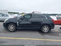 2013 Cadillac SRX — photo 14 of 16 | VIN 3GYFNCE30DS579693