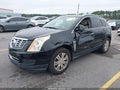 2013 Cadillac SRX — photo 2 of 16 | VIN 3GYFNCE30DS579693
