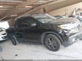 2019 Honda Ridgeline — photo 13 of 16 | VIN 5FPYK3F17KB046547