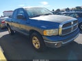 2002 Dodge Ram 1500 — photo 1 of 11 | VIN 3D7HA18NX2G117675