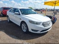 2015 Ford Taurus — photo 1 of 16 | VIN 1FAHP2E80FG112537