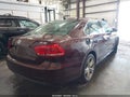 2014 Volkswagen Passat — photo 4 of 12 | VIN 1VWBS7A3XEC035698