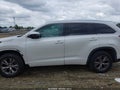 2015 Toyota Highlander — photo 14 of 16 | VIN 5TDKKRFH4FS090411