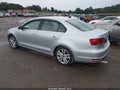 2014 Volkswagen Jetta — photo 3 of 11 | VIN 3VW4T7AJ4EM393091