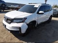 2021 Honda Piloto — photo 2 of 16 | VIN 5FNYF6H78MB057821