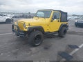 2000 Jeep Wrangler — photo 2 of 11 | VIN 1J4FA29P2YP797156