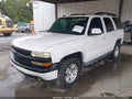 2004 Chevrolet Tahoe — photo 2 of 11 | VIN 1GNEK13Z34R120402