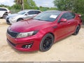 2015 Kia Optima — photo 2 of 16 | VIN 5XXGM4A70FG410911