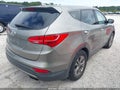 2015 Hyundai Santa Fe — photo 4 of 11 | VIN 5XYZT3LB4FG274835