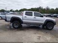 2014 Toyota Tacoma — photo 13 of 16 | VIN 5TFLU4EN6EX099824
