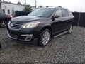 2015 Chevrolet Traverse — photo 2 of 11 | VIN 1GNKRGKD7FJ306372