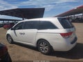 2014 Honda Odyssey — photo 14 of 16 | VIN 5FNRL5H67EB014619