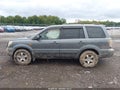 2008 Honda Pilot — photo 14 of 16 | VIN 5FNYF18508B019877