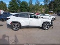 2022 Hyundai Tucson — photo 13 of 16 | VIN 5NMJF3AE7NH153206