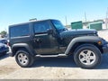 2011 Jeep Wrangler — photo 14 of 17 | VIN 1J4AA2D15BL636148