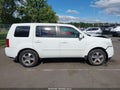 2013 Honda Pilot — photo 13 of 16 | VIN 5FNYF4H53DB013177
