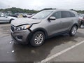 2016 Kia Sorento — photo 2 of 17 | VIN 5XYPGDA51GG059820