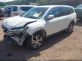 2016 Honda Pilot — photo 2 of 16 | VIN 5FNYF5H86GB010858