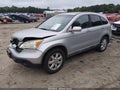 2009 Honda CR-V — photo 2 of 16 | VIN 5J6RE48789L011710