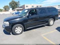 2003 GMC Yukon XL — photo 2 of 16 | VIN 1GKFK66U13J270522