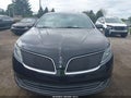 2013 Lincoln MKS — photo 12 of 16 | VIN 1LNHL9FT5DG603907