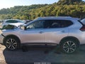 2018 Nissan Rogue — photo 14 of 16 | VIN JN8AT2MV2JW310621