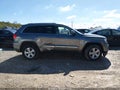2012 Jeep Grand Cherokee — photo 13 of 16 | VIN 1C4RJFAG9CC255834