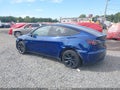 2024 Tesla Model Y — photo 19 of 19 | VIN 7SAYGDEE7RA320926