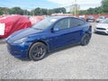 2024 Tesla Model Y — photo 6 of 19 | VIN 7SAYGDEE7RA320926