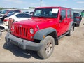 2015 Jeep Wrangler Unlimited — photo 2 of 16 | VIN 1C4BJWKG5FL630106
