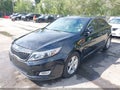 2015 Kia Optima — photo 2 of 16 | VIN 5XXGM4A76FG397226