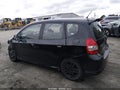2007 Honda Fit — photo 14 of 16 | VIN JHMGD38697S052172