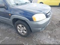 2002 Mazda Tribute — photo 6 of 12 | VIN 4F2CU081X2KM48381