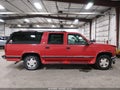 1999 GMC Suburban — photo 14 of 20 | VIN 1GKFK16R7XJ750584