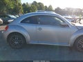 2014 Volkswagen Beetle — photo 13 of 16 | VIN 3VWJP7AT8EM612904