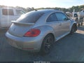 2014 Volkswagen Beetle — photo 4 of 16 | VIN 3VWJP7AT8EM612904