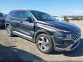 2021 Hyundai Santa Fe — photo 1 of 16 | VIN 5NMS24AJXMH364384