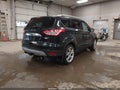 2014 Ford Escape — photo 4 of 15 | VIN 1FMCU9J94EUA96102