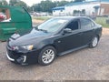 2016 Mitsubishi Lancer — photo 2 of 11 | VIN JA32U2FU8GU002423