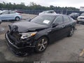 2019 Kia Optima — photo 2 of 16 | VIN 5XXGT4L34KG280557
