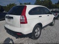 2009 Honda CR-V — photo 4 of 16 | VIN 5J6RE38319L012057
