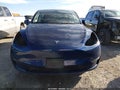2022 Tesla Model Y — photo 12 of 18 | VIN 7SAYGDEE7NF319711