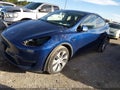 2022 Tesla Model Y — photo 2 of 18 | VIN 7SAYGDEE7NF319711