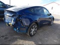 2022 Tesla Model Y — photo 4 of 18 | VIN 7SAYGDEE7NF319711