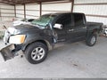 2009 Nissan Titan — photo 2 of 17 | VIN 1N6BA07C69N309782